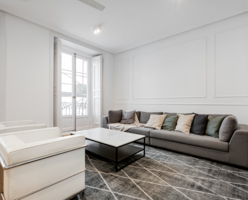 Reforma integral de vivienda con diseño arquitectónico personalizado.